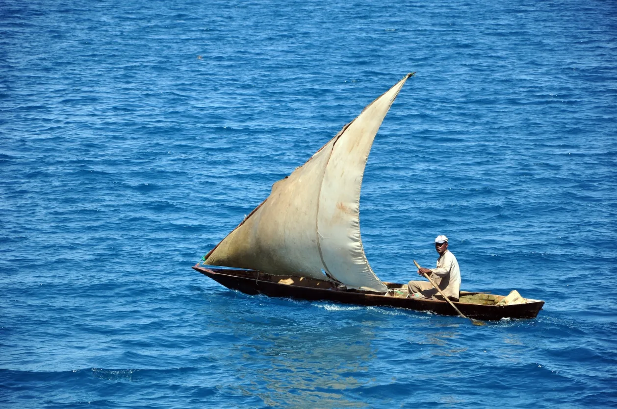 Man Sailing a Dhow